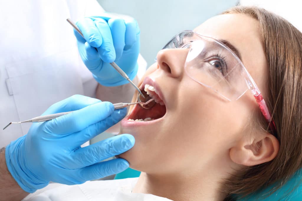 How Do Dentists Deep Clean Your Teeth Featured Image - Bowen Family Dentistry
